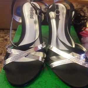 Woman black and silver high heel 👀